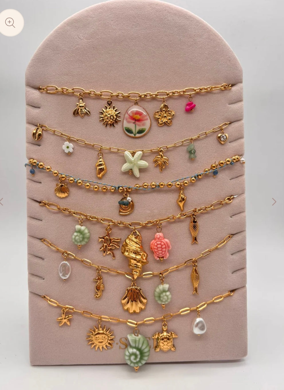 Un collier breloques au hasard ! :)choisis ta couleur
