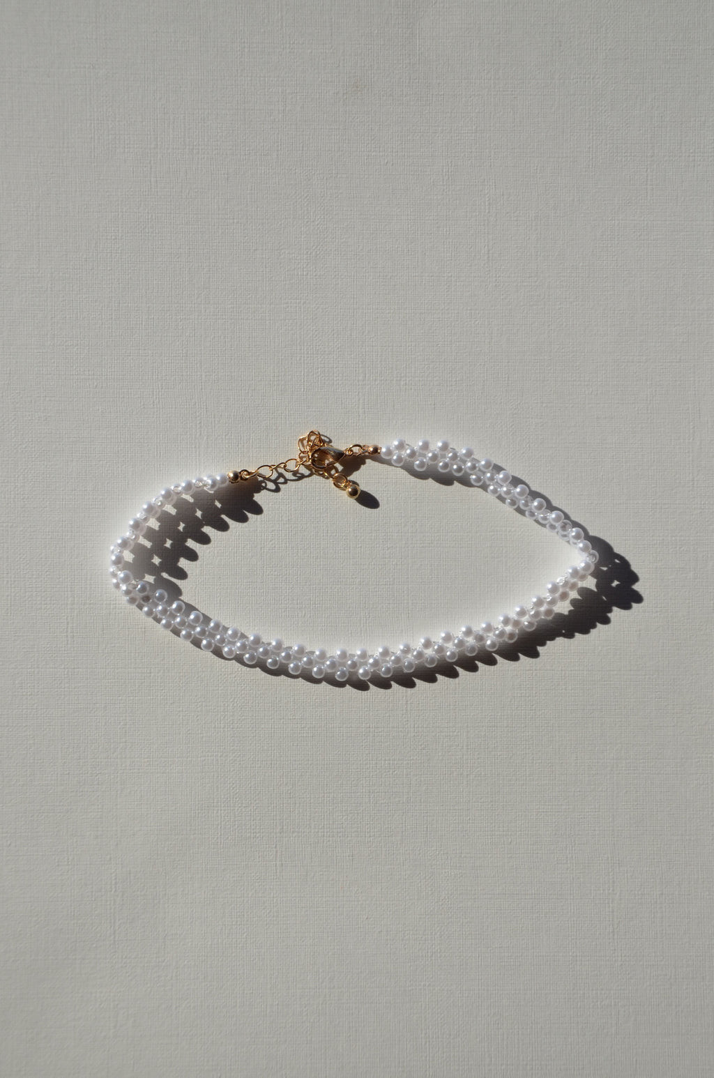 Collier ras de cou petites perles