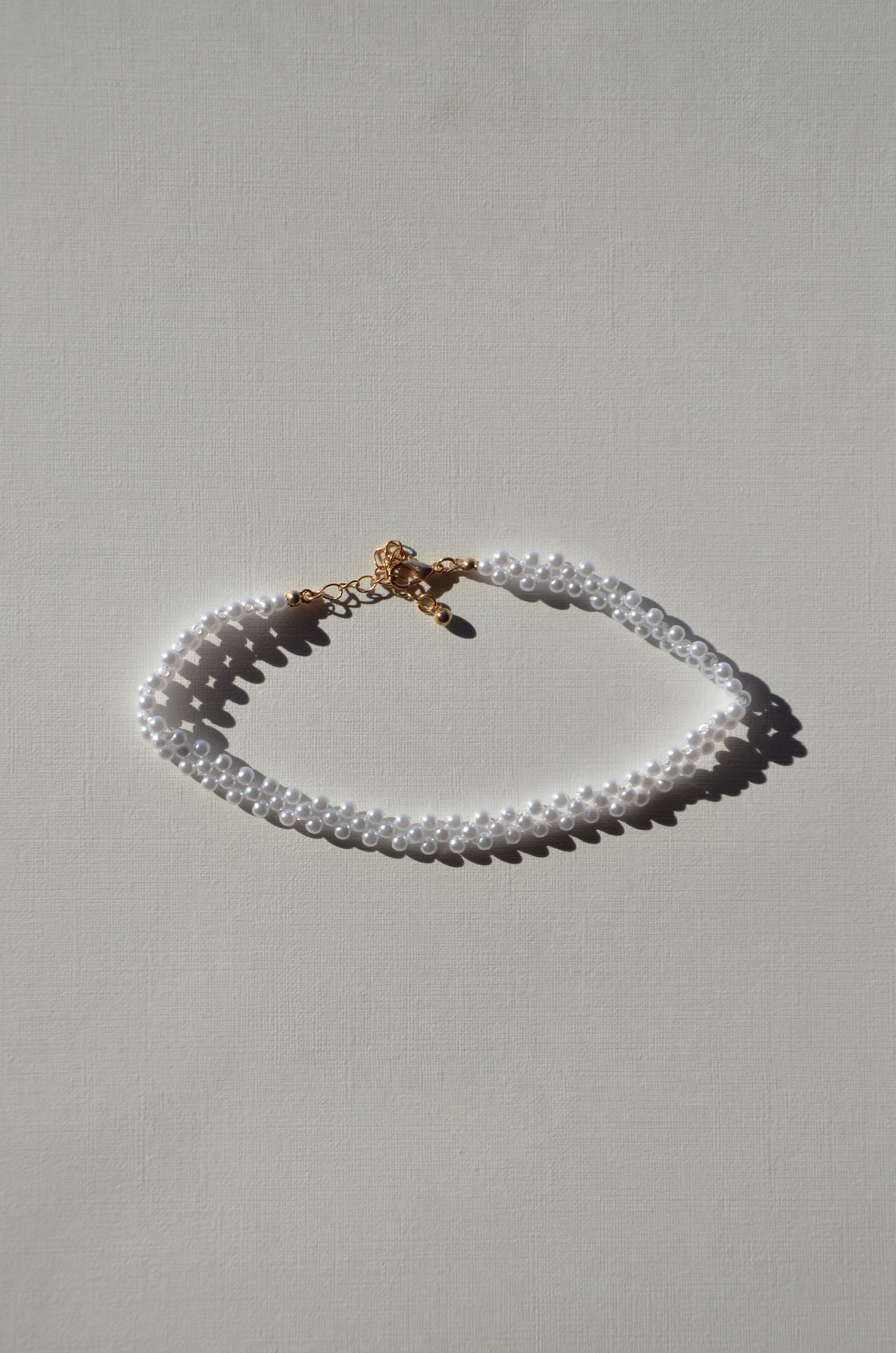 Collier ras de cou petites perles