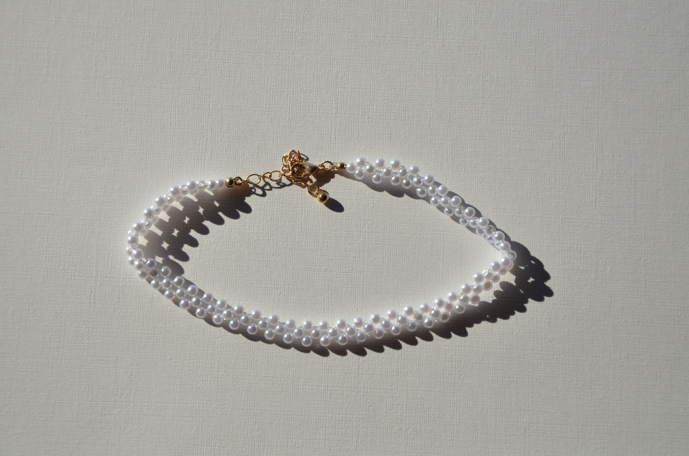 Collier ras de cou petites perles