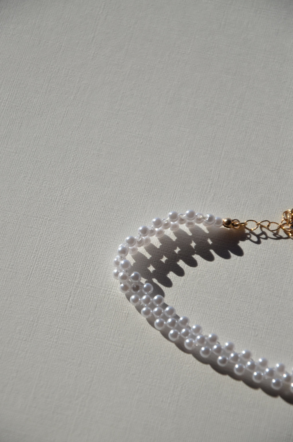 Collier ras de cou petites perles