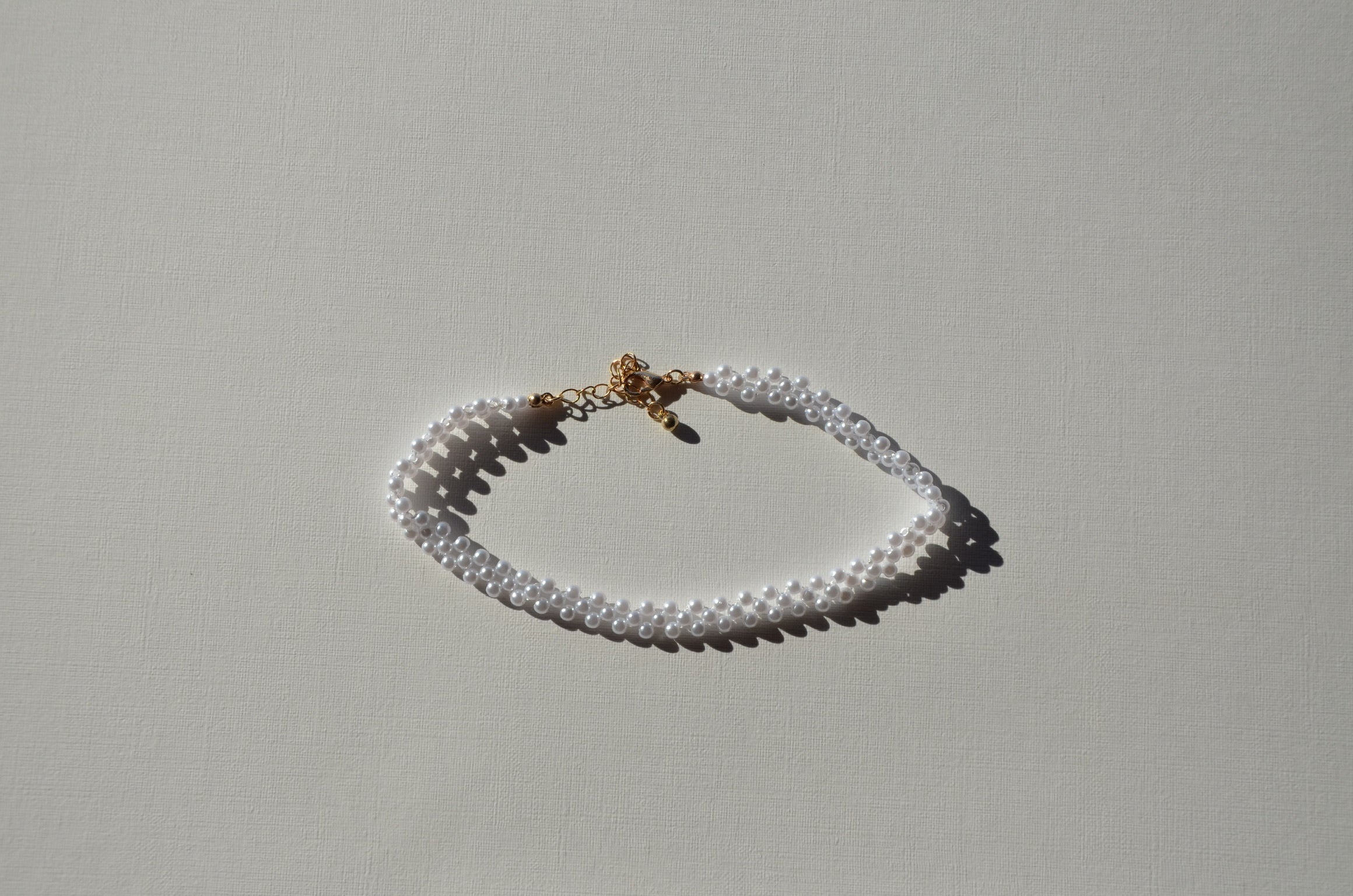 Collier ras de cou petites perles